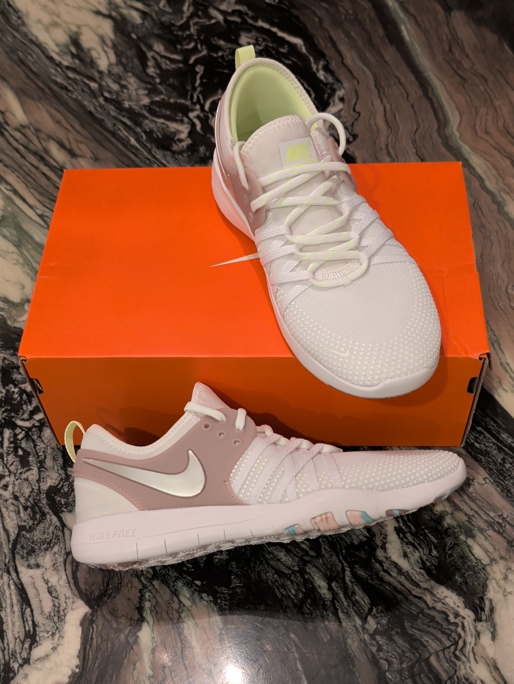 Nike Women’s White and Pale Pink Athletic Sneakers